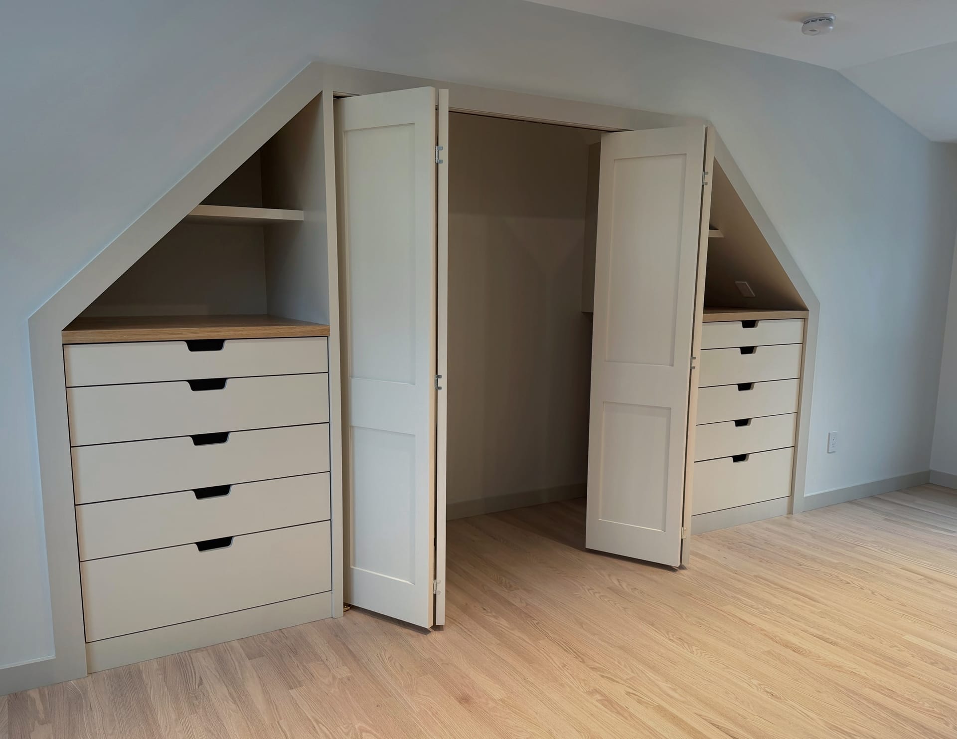 Floor-to-ceiling built-in bookshelves in home office